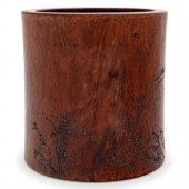 A Chinese Carved Hardwood Brus