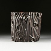 A CHINESE CARVED HARDWOOD BRUS