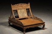 A CHINESE CARVED HARDWOOD CHAI