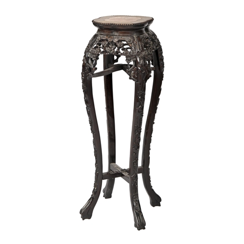 A Chinese carved hardwood