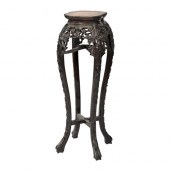A Chinese carved hardwood jard