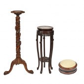 A Chinese carved hardwood jard