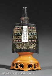 A Chinese Carved Horn Jewel an