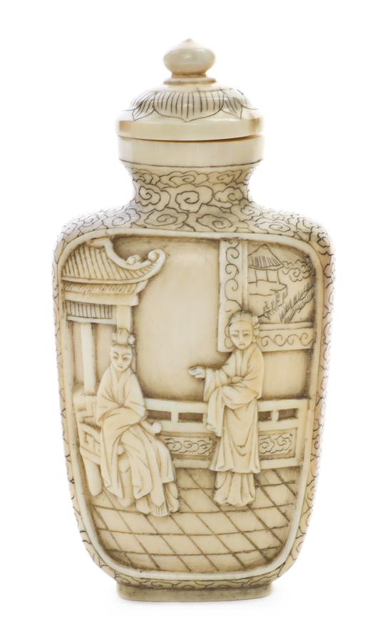* A Chinese Carved Ivory Snuff
