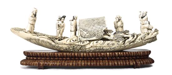 A Chinese Carved Ivory Boat