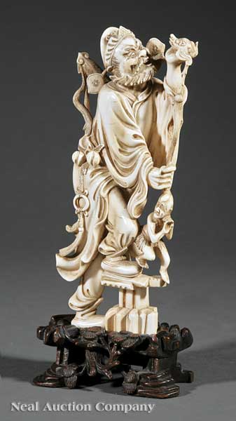 A Chinese Carved Ivory Figure of