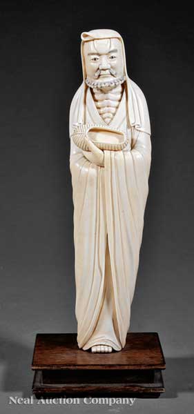 A Chinese Carved Ivory Figure of