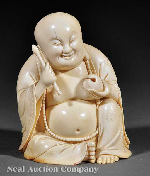A Chinese Carved Ivory Figure of