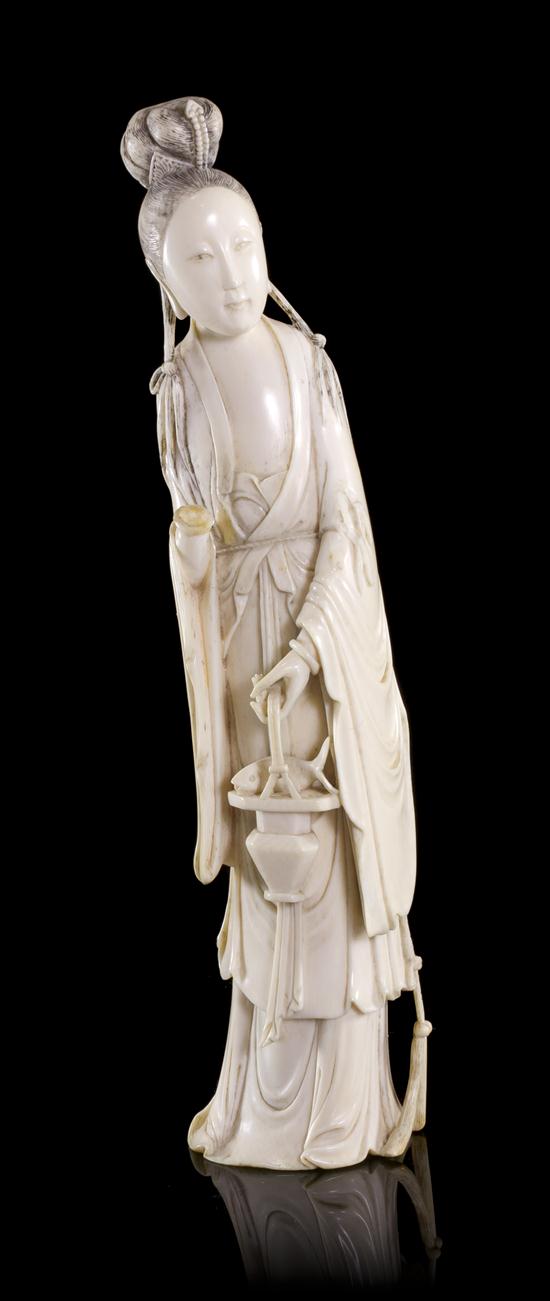 A Chinese Carved Ivory Figure of