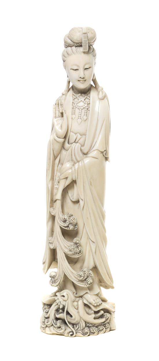 A Chinese Carved Ivory Figure of