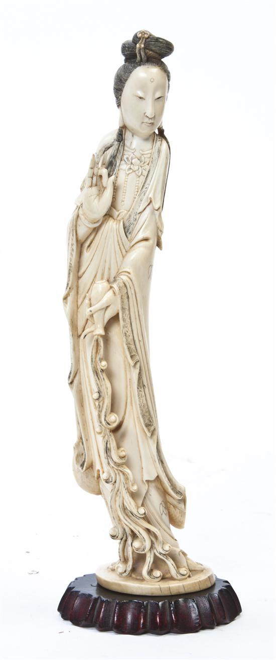 A Chinese Carved Ivory Figure of