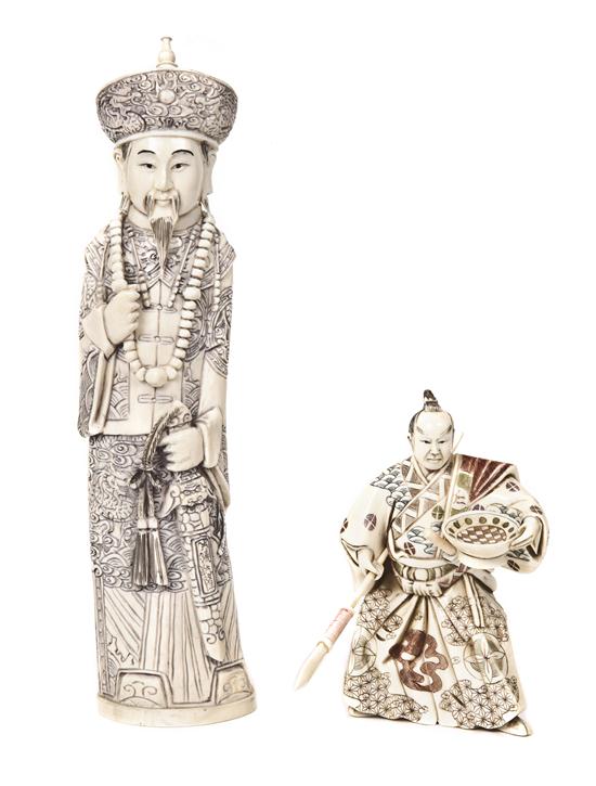 A Chinese Carved Ivory Figure of