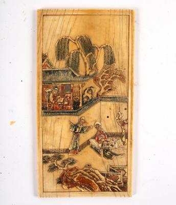 A Chinese carved ivory panel,