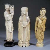 A Chinese carved ivory standin