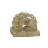 A CHINESE CARVED JADE BEAST SE