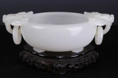 A CHINESE CARVED JADE BRUSH WA