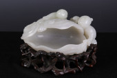 A CHINESE CARVED JADE BRUSH WA