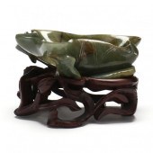 A CHINESE CARVED JADE BRUSH WA