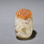 A CHINESE CARVED JADE DECORATI
