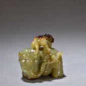 A CHINESE CARVED JADE DECORATI