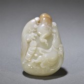 A CHINESE CARVED JADE DECORATI