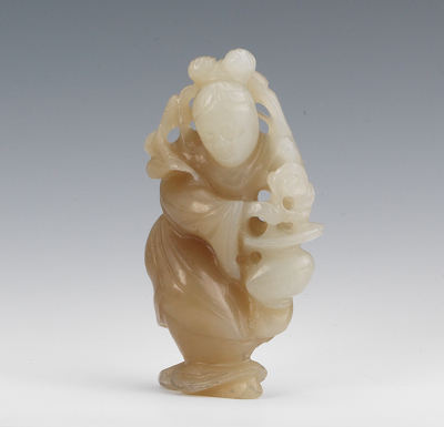 A Chinese Carved Jade Figure The