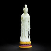 A CHINESE CARVED JADE FIGURE O