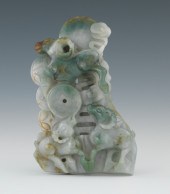 A Chinese Carved Jade Grouping
