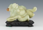 A Chinese Carved Jade Happy Bu