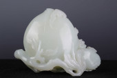 A CHINESE CARVED JADE PEACHES