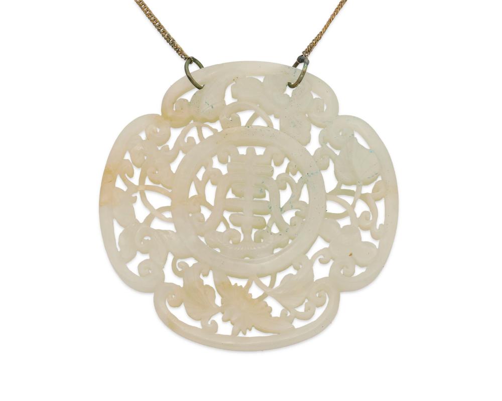A CHINESE CARVED JADE PENDANTA