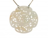 A CHINESE CARVED JADE PENDANTA