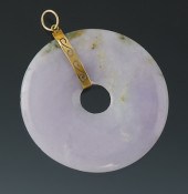 A Chinese Carved Jadeite Disk
