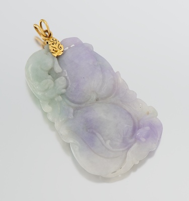 A Chinese Carved Jadeite Pendant