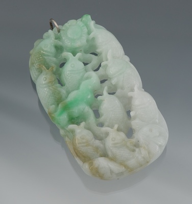 A Chinese Carved Jadeite Pendant