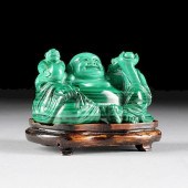 A CHINESE CARVED MALACHITE FIG