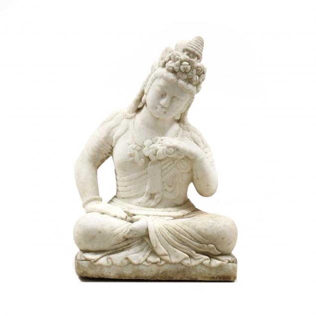 A CHINESE CARVED MARBLE GUANYIN