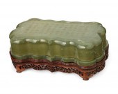 A CHINESE CARVED NEPHRITE BOXA