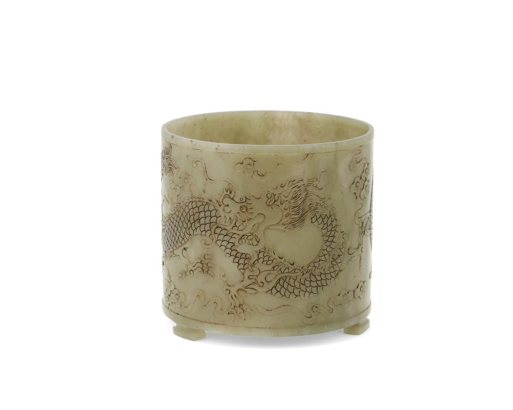 A CHINESE CARVED NEPHRITE BRUSH