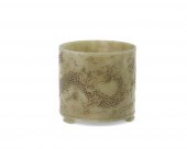 A CHINESE CARVED NEPHRITE BRUS