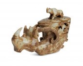 A CHINESE CARVED NEPHRITE LIDD