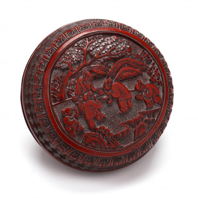 A CHINESE CARVED RED LACQUER