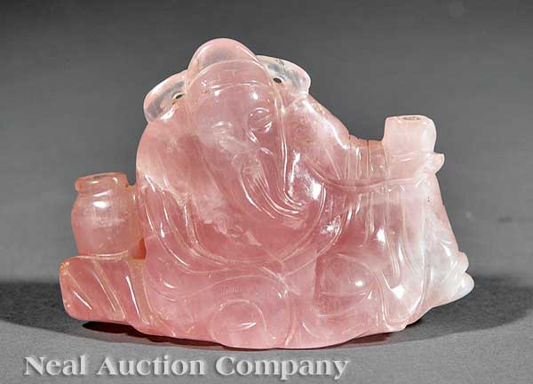 A Chinese Carved Rose Quartz Figure