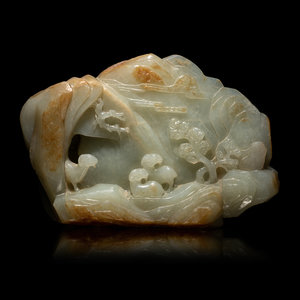 A Chinese Carved Russet and Pale