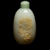 A Chinese Carved Russet and Pa