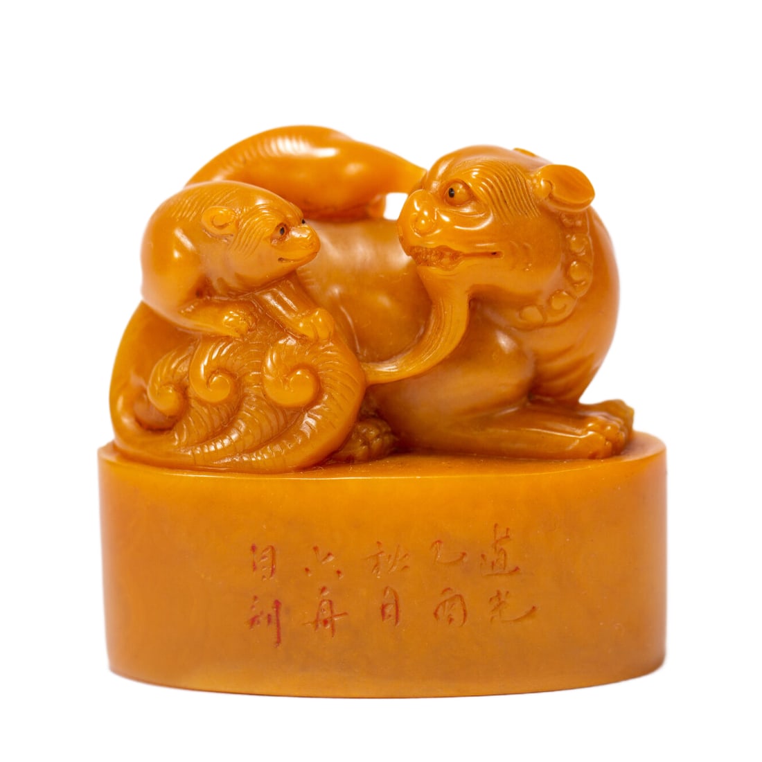 A CHINESE CARVED SOAPSTONE BEAST