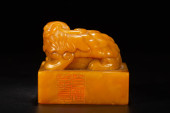 A CHINESE CARVED SOAPSTONE BEA