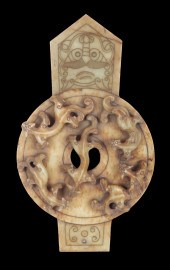 A CHINESE CARVED SOAPSTONE ROU