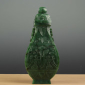 A CHINESE CARVED SPINACH GREEN