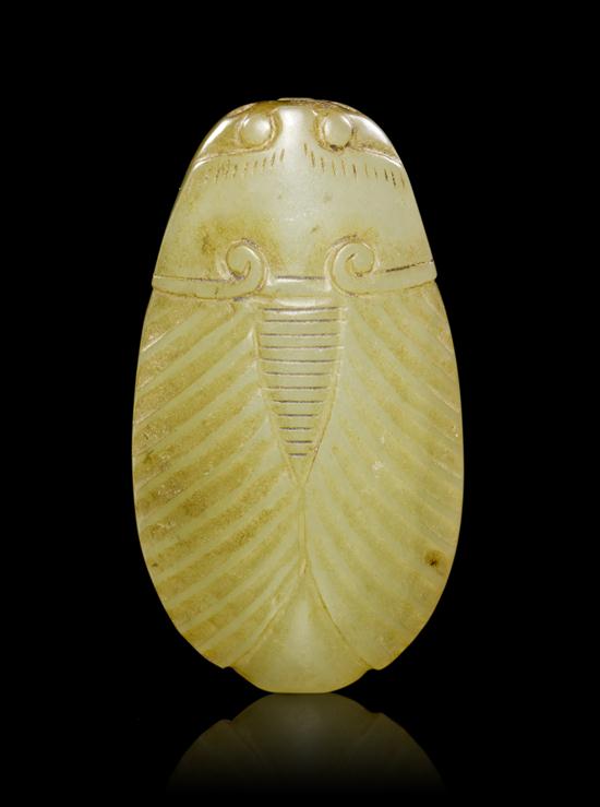 * A Chinese Carved White Nephrite